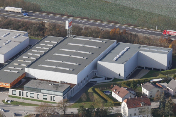 Geschichte 2014 Erweiterung Firmengebaeude Machacek Baustoffhandel